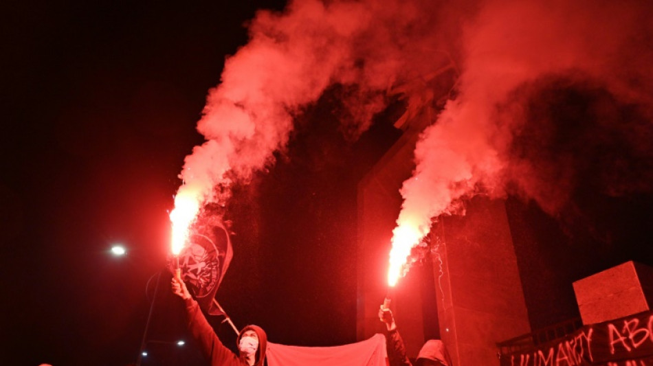 Indonesian football postpones match between stadium tragedy rivals