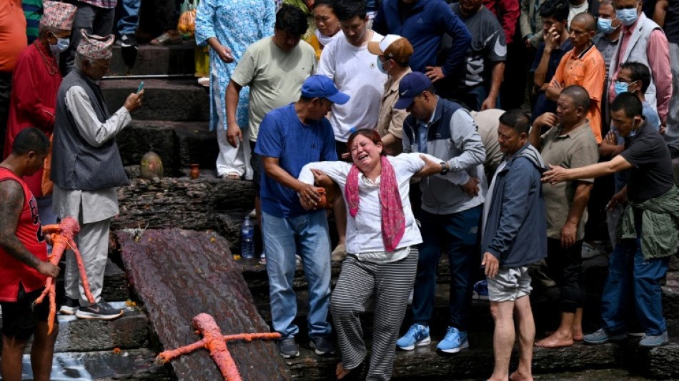 DNA tests and funerals in Nepal, a week after deadly floods