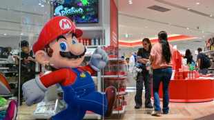 Gold nears $5,000, stocks muted after turbulent week