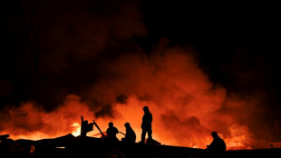 Huge fire sparked by explosions near Argentine capital 'contained'