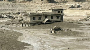 Hundreds missing after Nepal-Tibet flood kills 98