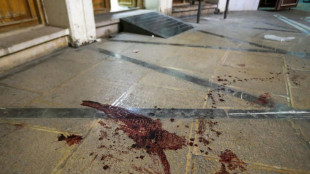 Iran arrests four more after fatal shooting at Shiite shrine