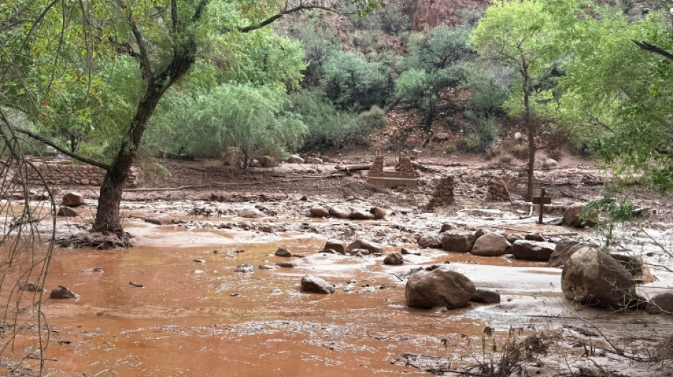 New storms threaten Grand Canyon flood search, 2 bodies recovered
