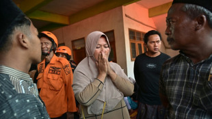 Rescuers search for 59 people trapped under collapsed Indonesian school