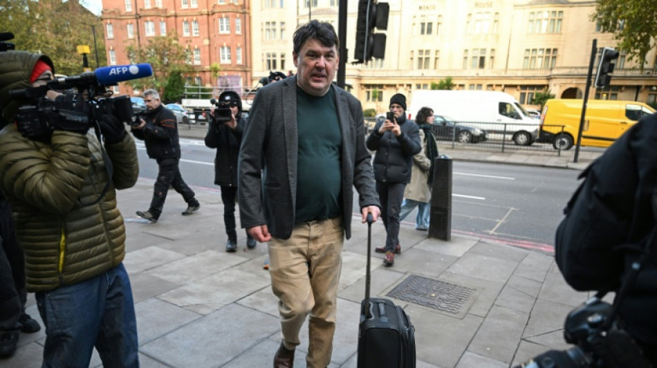 UK court clears comedy writer of damaging transgender activist's phone