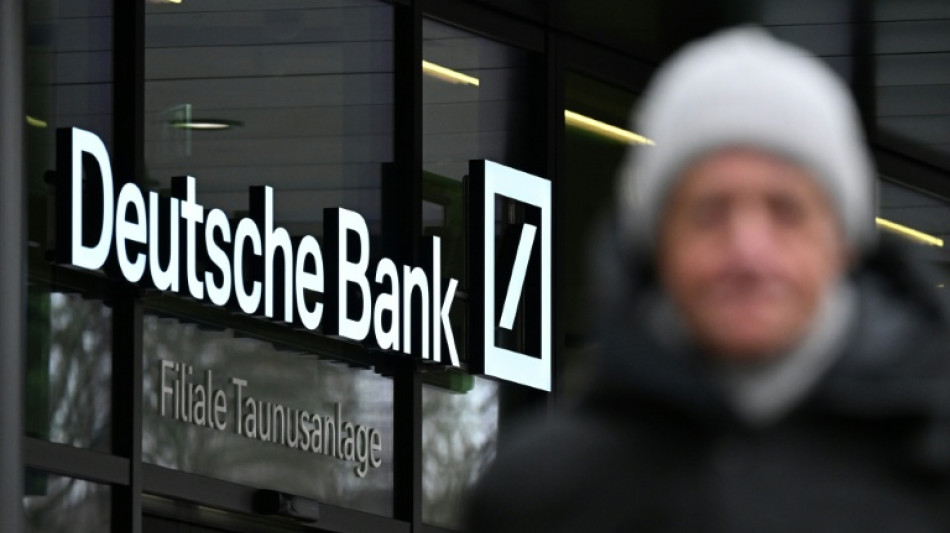 Deutsche Bank logs record profits, as new probe casts shadow