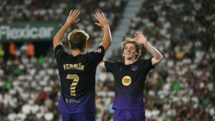 Liga holders Barcelona crush Elche, Atletico salvage Villarreal draw
