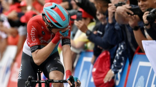 Kron grabs emotional Vuelta stage win for 'heartbroken' team