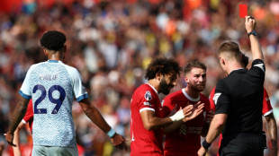 Ten-man Liverpool beat Bournemouth, Brighton go top of Premier League
