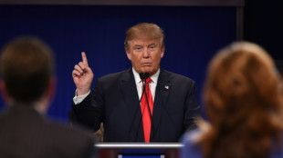 Absent Trump expected to steal show at Republican debate