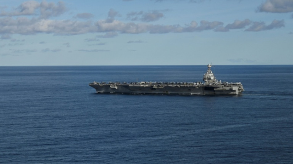 Arrival of US aircraft carrier fuels Venezuelan fears of attack