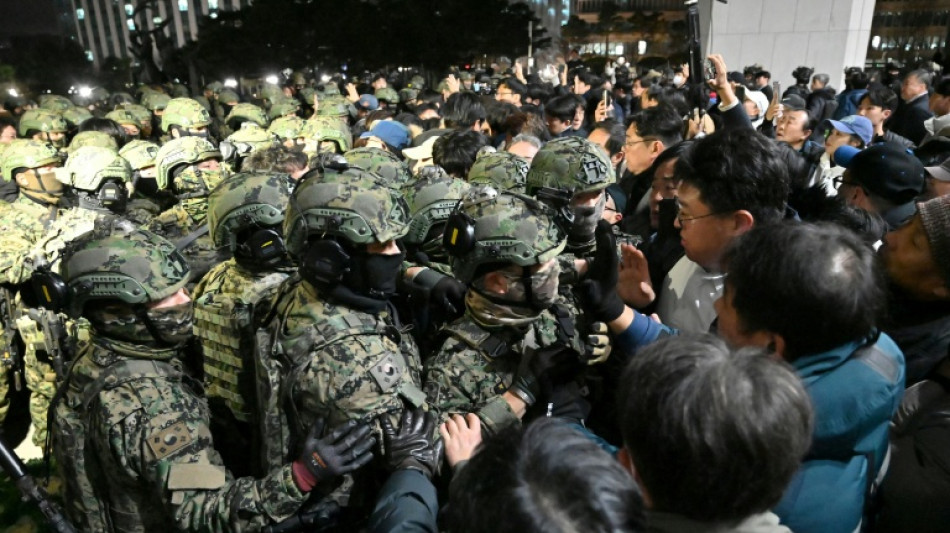 En Cor&eacute;e du Sud, trois vies boulevers&eacute;es par la loi martiale