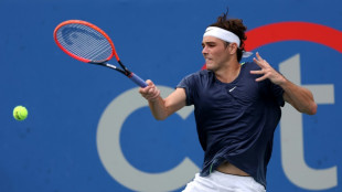 Fritz outlasts Murray to advance at rain-hit Washington