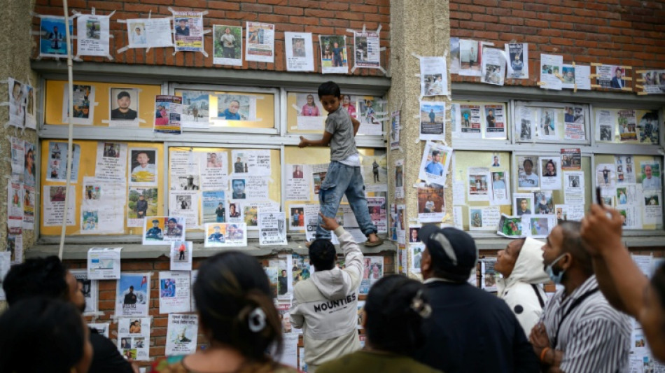 Nepal's wall of missing offers last hope after Himalayan flood