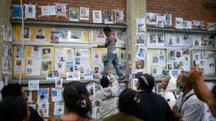 Un mur des disparus, dernier espoir des familles de retrouver leurs disparus depuis la crue