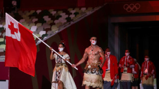 Tongan Olympic flagbearer Taufatofua prays for news of father
