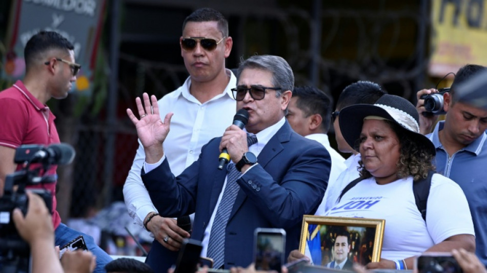 Honduran judge drops corruption charges against ex-leader Hernandez